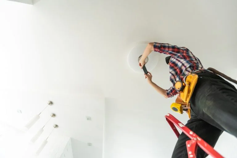 Electrician Installing Led Light Bulbs
